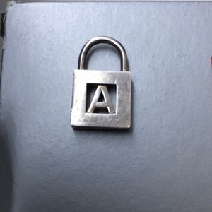 Tiffany & Co sterling silver letter “A” lock